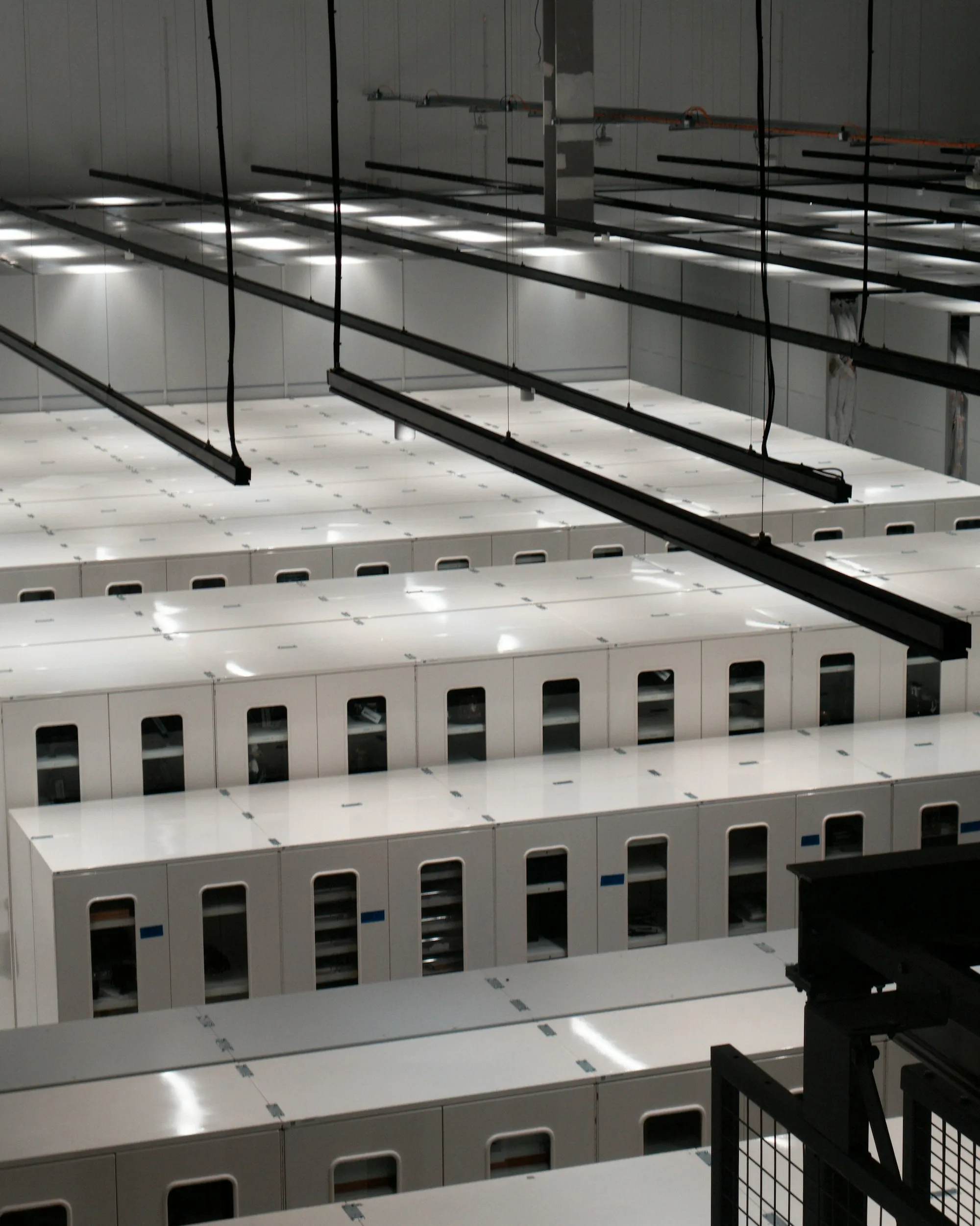 Rows of server cabinets in a data centre